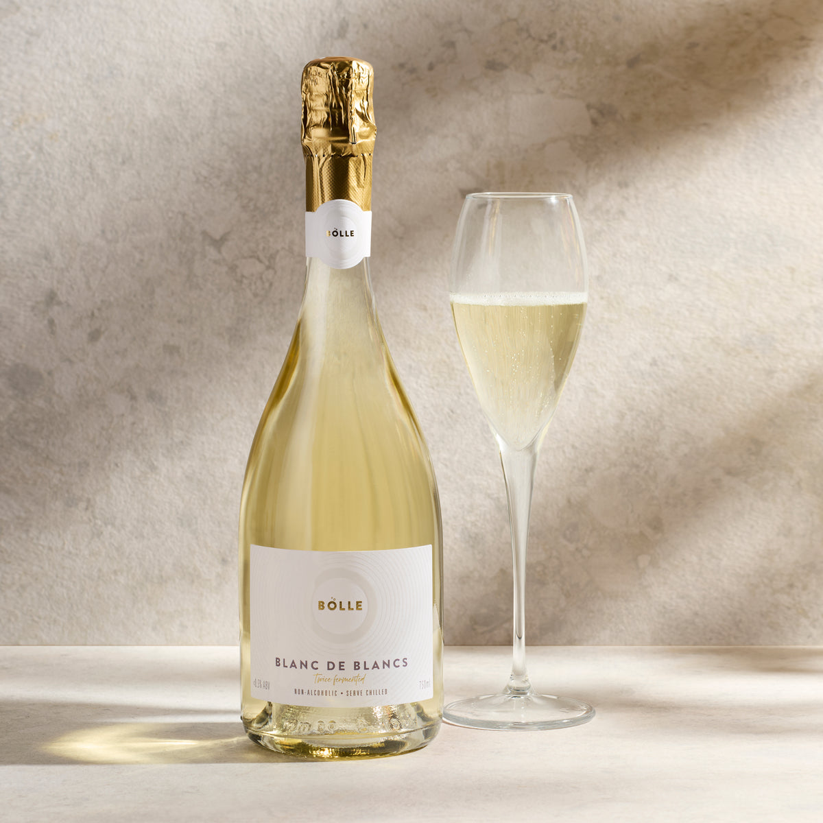 BOLLE Blanc de Blancs non-alcoholic sparkling wine 750ml bottle and glass